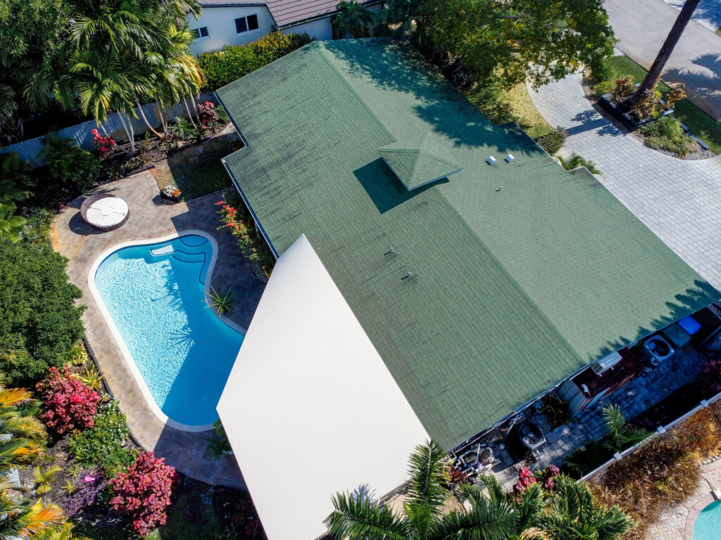 Aerial drone photography of a residential property with swimming pool in Fort Lauderdale by AdsMiami